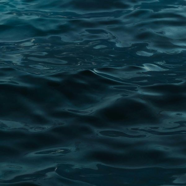 Abstract image of gentle waves or airflow, representing the calm flow of breath.